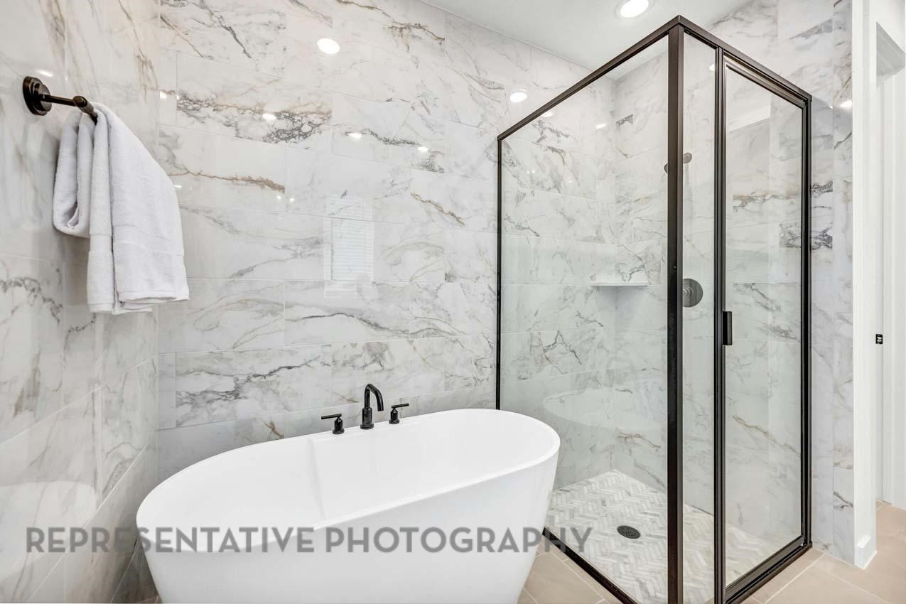 22223 Mount Whitney Road Waller, TX 77484 - Photo 15 of 19 a bathroom with a bathtub and shower