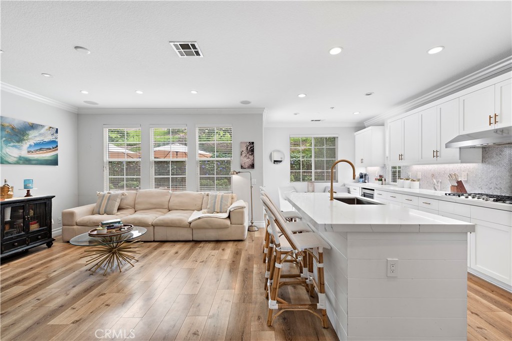 8 Bluewing Lane Ladera Ranch, CA 92694 - Photo 12 of 55 a living room with furniture and a table