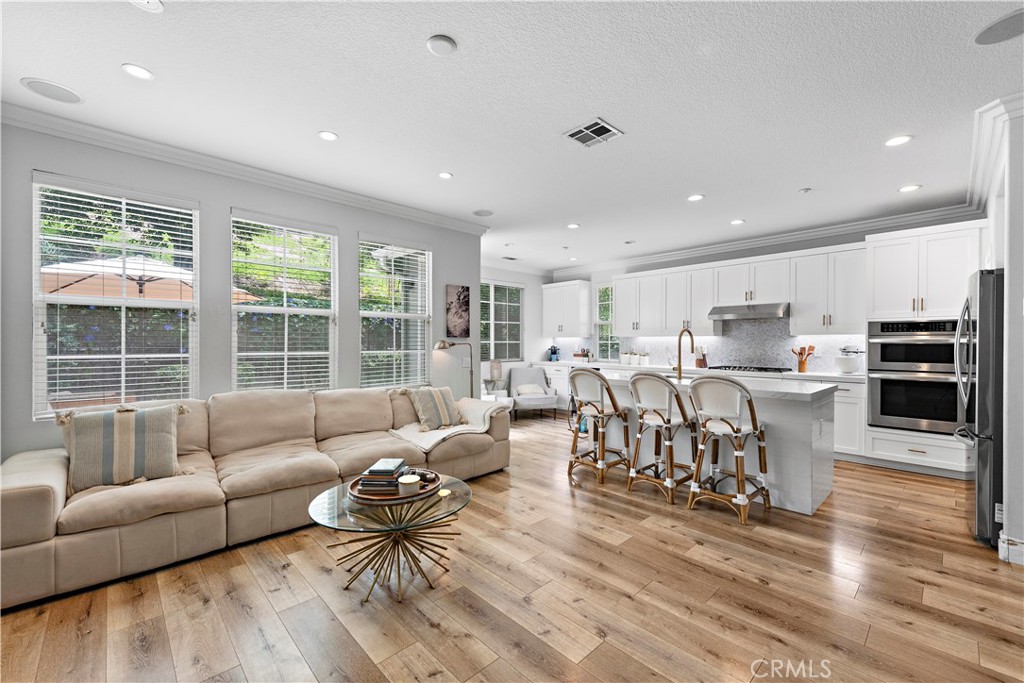 8 Bluewing Lane Ladera Ranch, CA 92694 - Photo 13 of 55 a living room with furniture and a large window