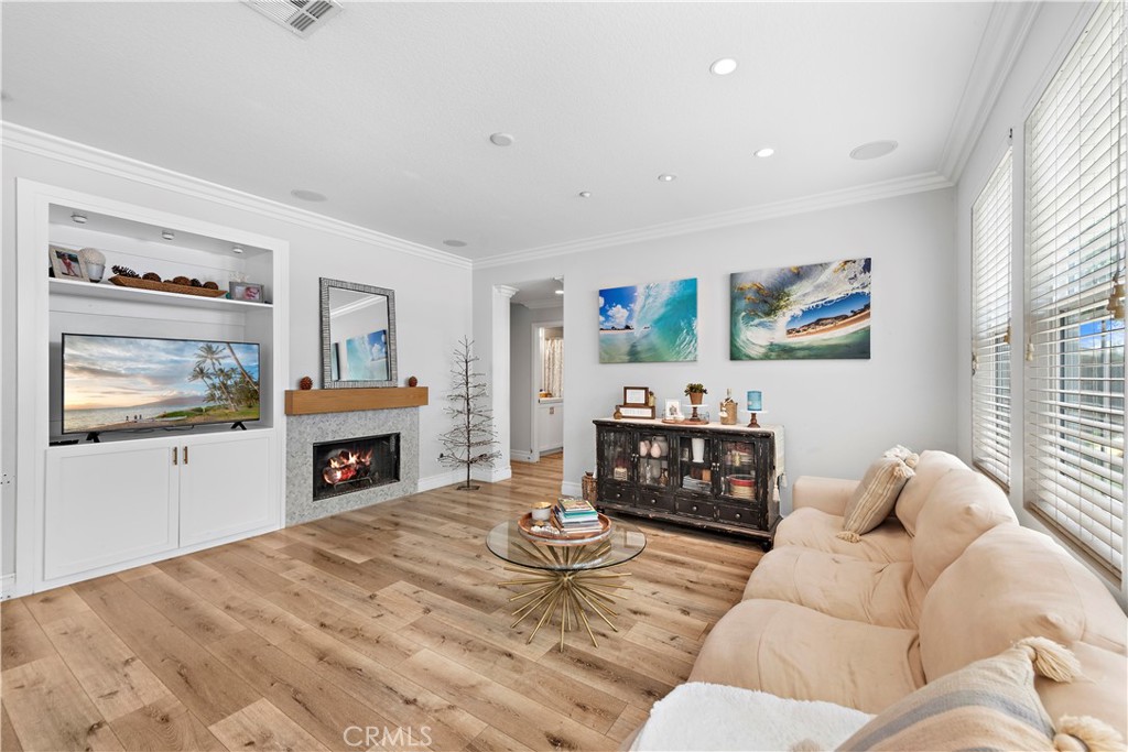 8 Bluewing Lane Ladera Ranch, CA 92694 - Photo 22 of 55 a living room with furniture and a fireplace