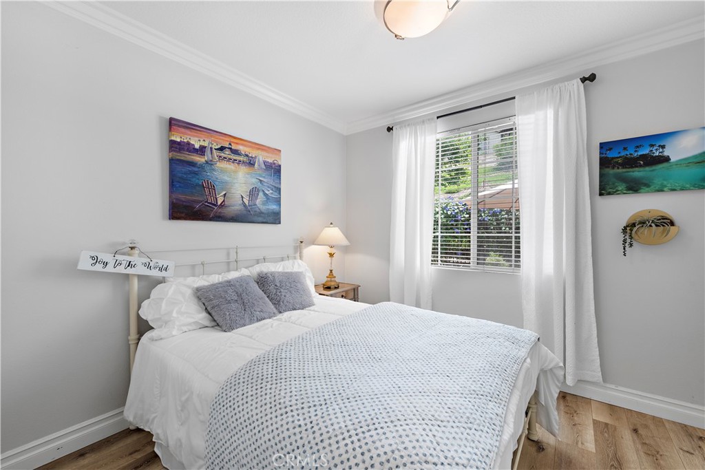 8 Bluewing Lane Ladera Ranch, CA 92694 - Photo 24 of 55 a bedroom with a bed and a window