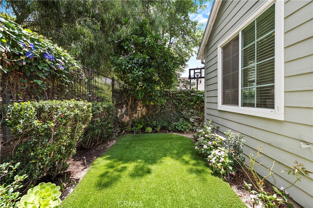 8 Bluewing Lane Ladera Ranch, CA 92694 - Photo 27 of 55 a view of a house with a flower garden