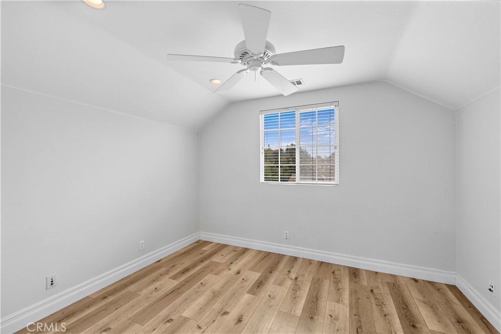 8 Bluewing Lane Ladera Ranch, CA 92694 - Photo 40 of 55 an empty room with a window and a ceiling fan