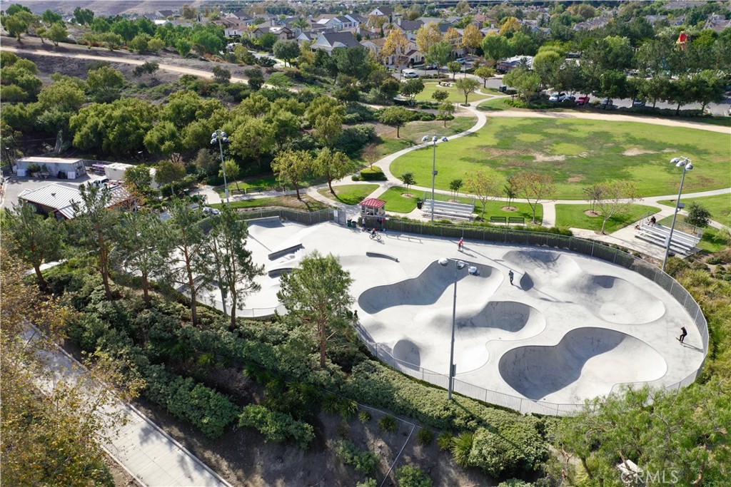 8 Bluewing Lane Ladera Ranch, CA 92694 - Photo 52 of 55 an aerial view of a house with a yard and lake