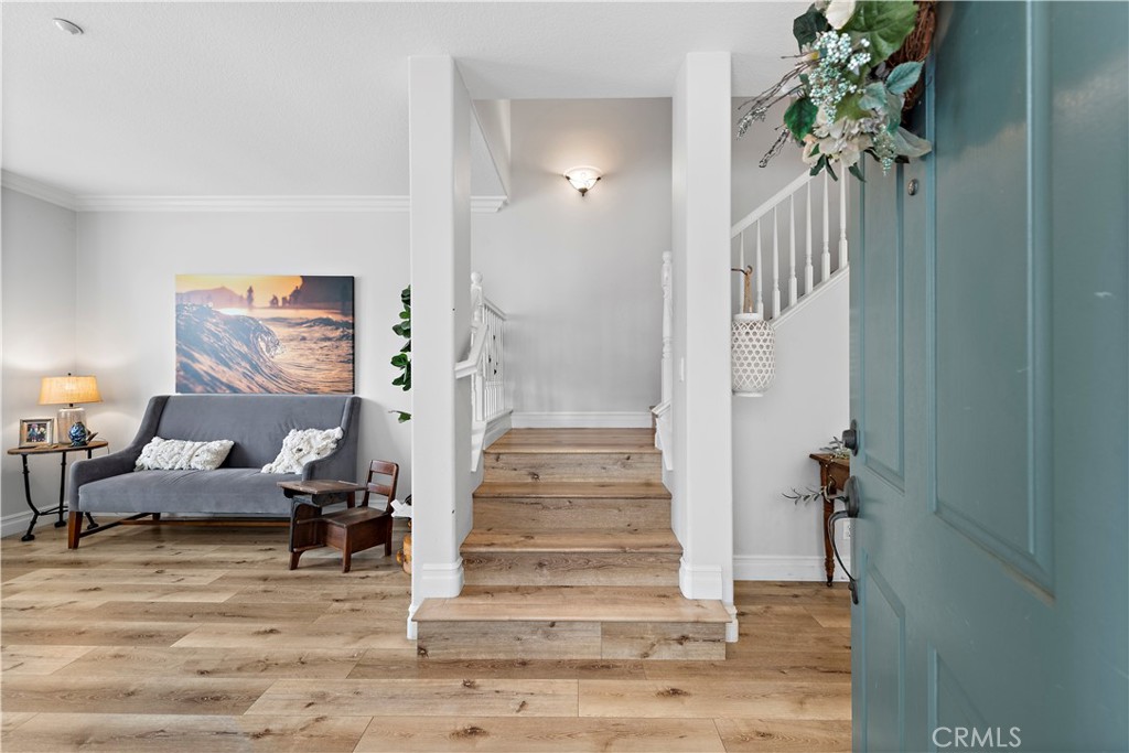 8 Bluewing Lane Ladera Ranch, CA 92694 - Photo 6 of 55 a view of entryway livingroom and hall with wooden floor