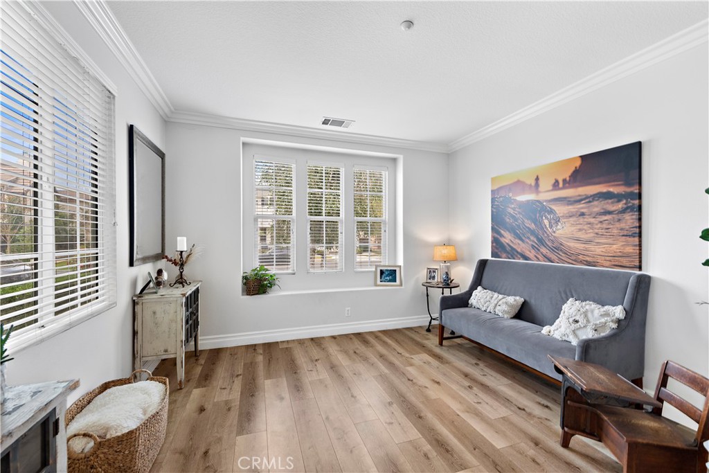 8 Bluewing Lane Ladera Ranch, CA 92694 - Photo 7 of 55 a living room with furniture and a window