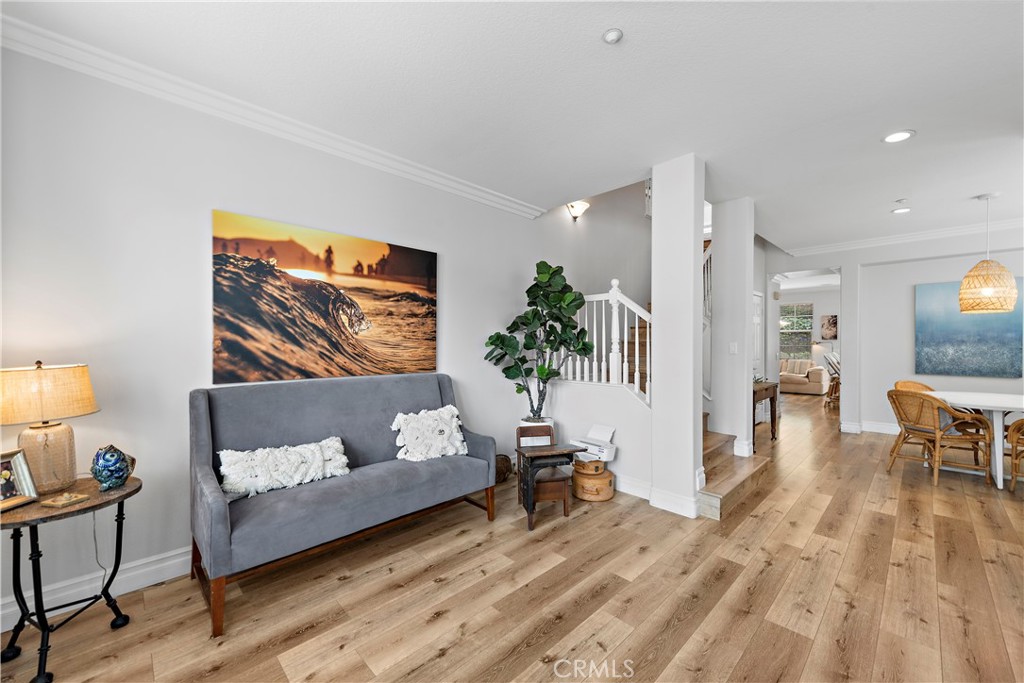 8 Bluewing Lane Ladera Ranch, CA 92694 - Photo 8 of 55 a living room with furniture and wooden floor