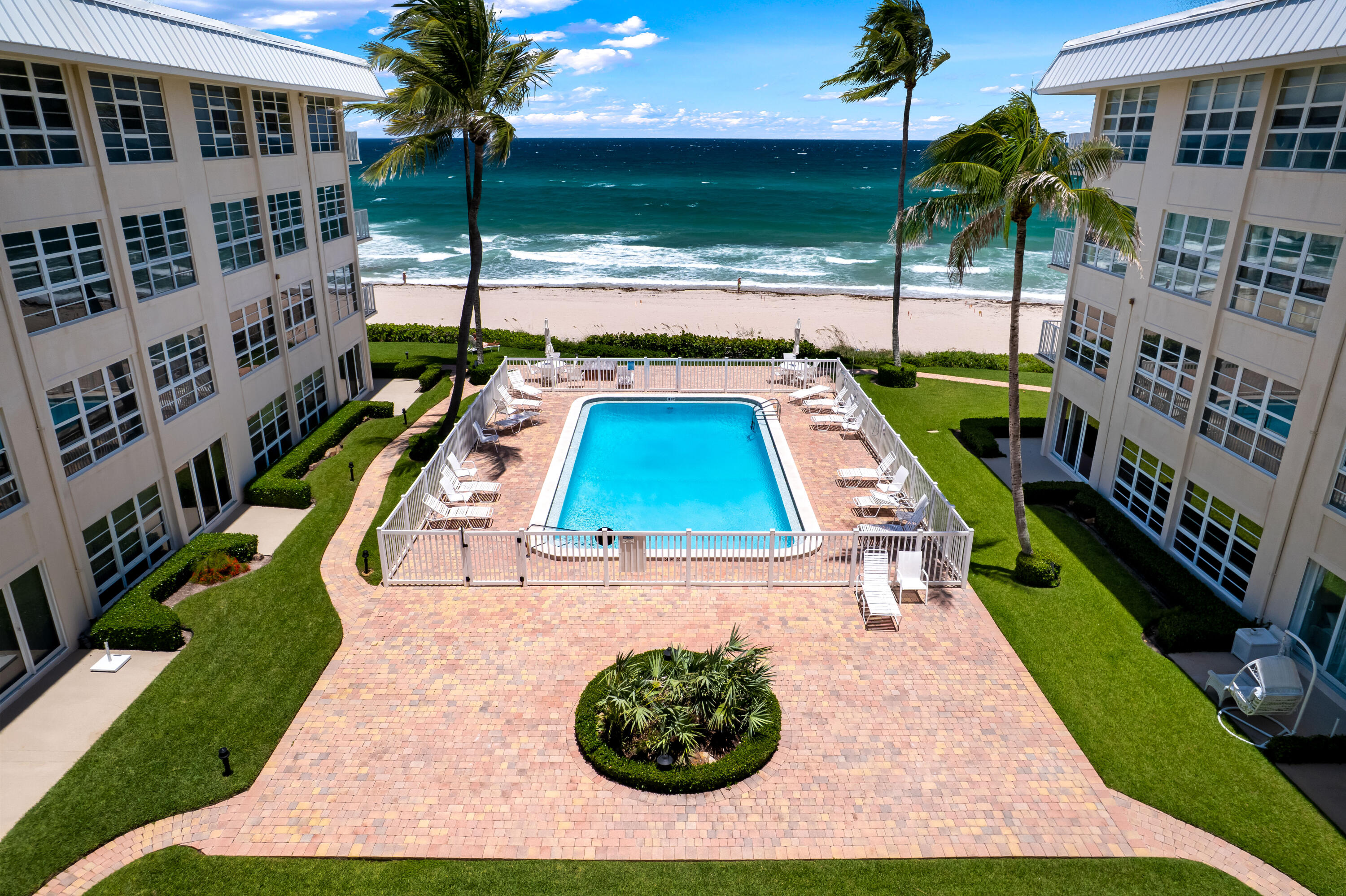 a view of swimming pool with a garden