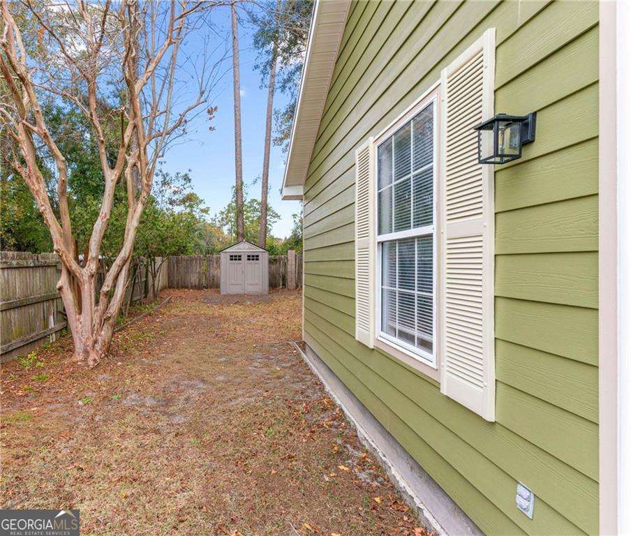 336 Terrapin Trail Brunswick, GA 31525 - Photo 24 of 24 a front view of a house with a yard