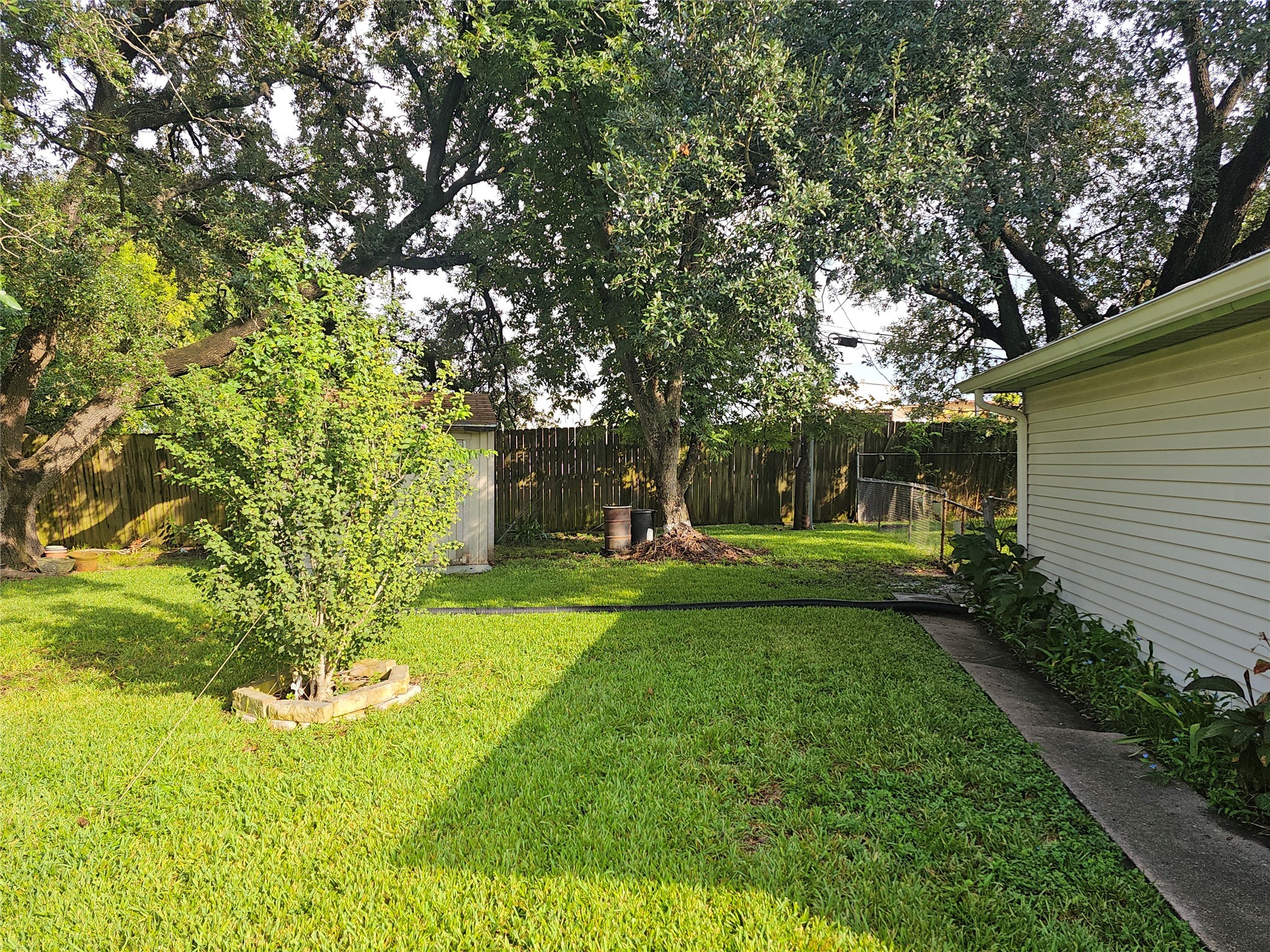 201 Delta Street Pasadena, TX 77506 - Photo 6 of 19 a view of a house with a yard