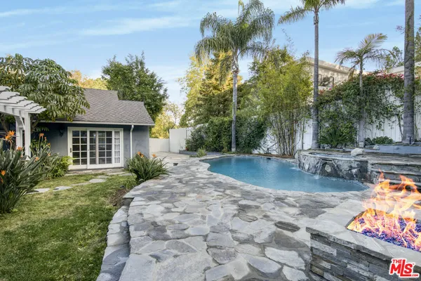 a view of a house with swimming pool
