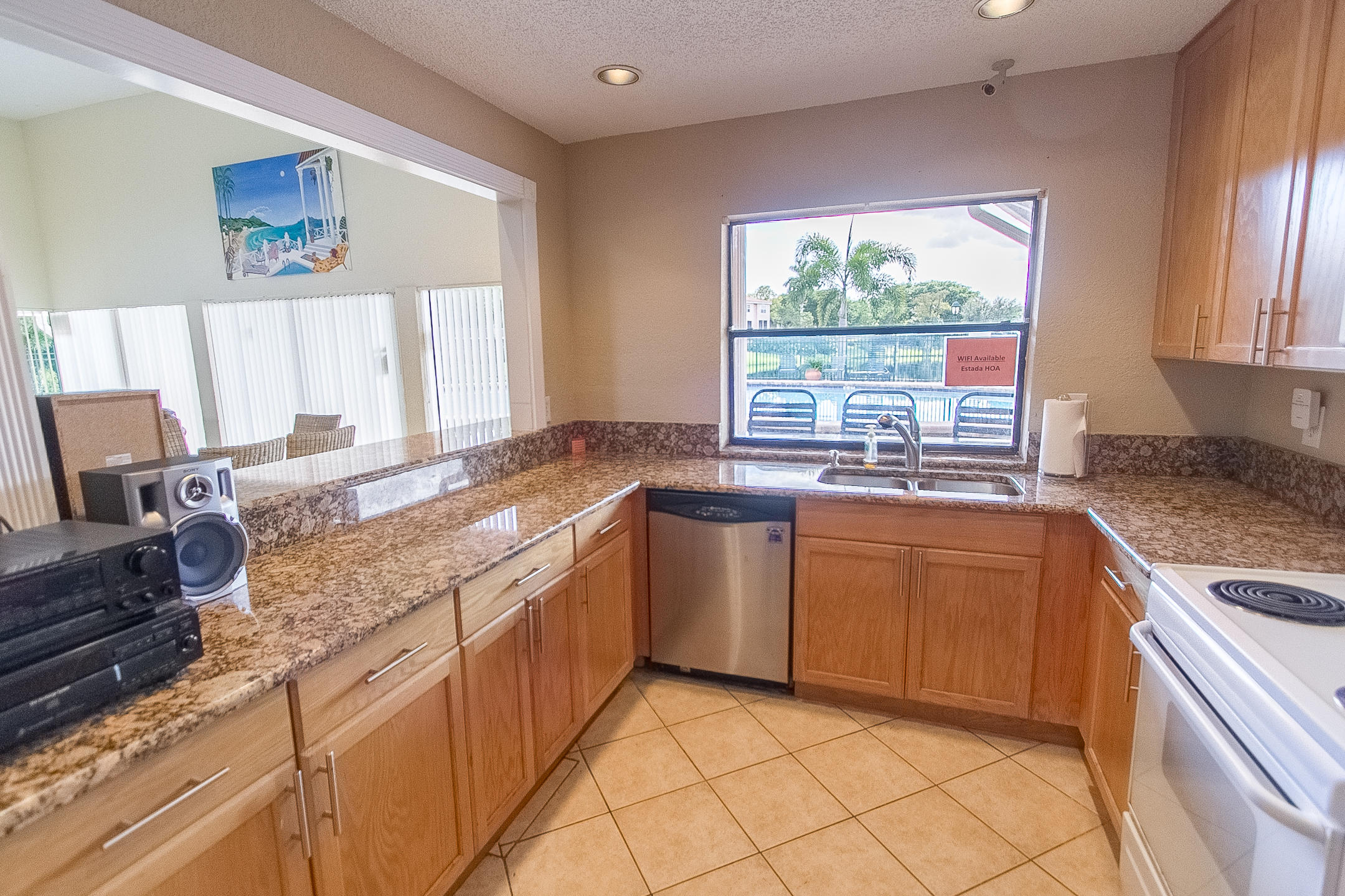 20851 Vía Madeira Boca Raton, FL 33433 - Photo 30 of 32 Estada Clubhouse Kitchen