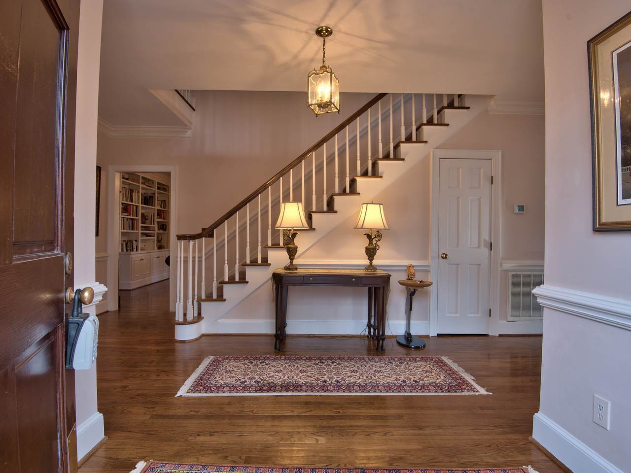 3809 Chippenham Road Durham, NC 27707 - Photo 2 of 23 Formal foyer is generously proportioned to include guest closets and powder room. Entry