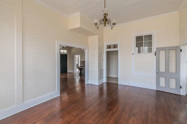 a view of a kitchen with a stove and a window
