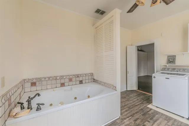 a kitchen with a stove a sink and a refrigerator