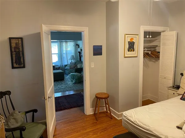 a bedroom with a bed and furniture