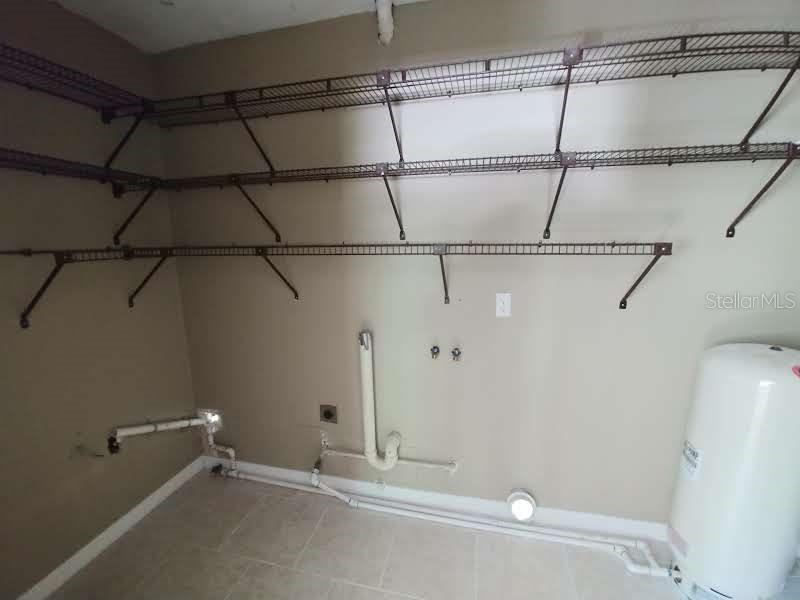 190 North Bobwhite Point Inverness, FL 34453 - Photo 7 of 13 a view of a room with racks on the wall