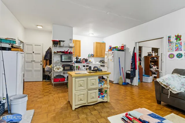 a bathroom with a toilet sink and shower