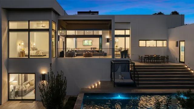 a view of a living room with a large window