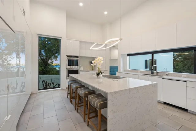 a very nice looking living room with a large window