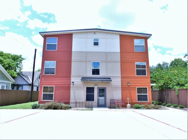 a front view of a house with yard