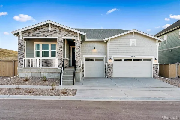 a view of a house with a garage
