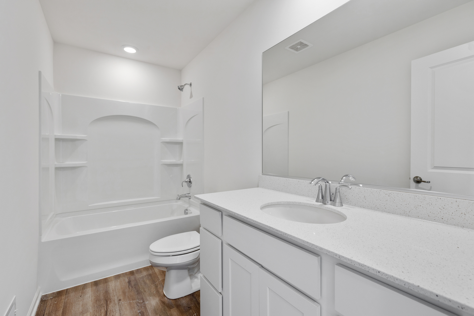 1464 Collins Street Elburn, IL 60119 - Photo 13 of 15 a bathroom with a sink a toilet and a bathtub
