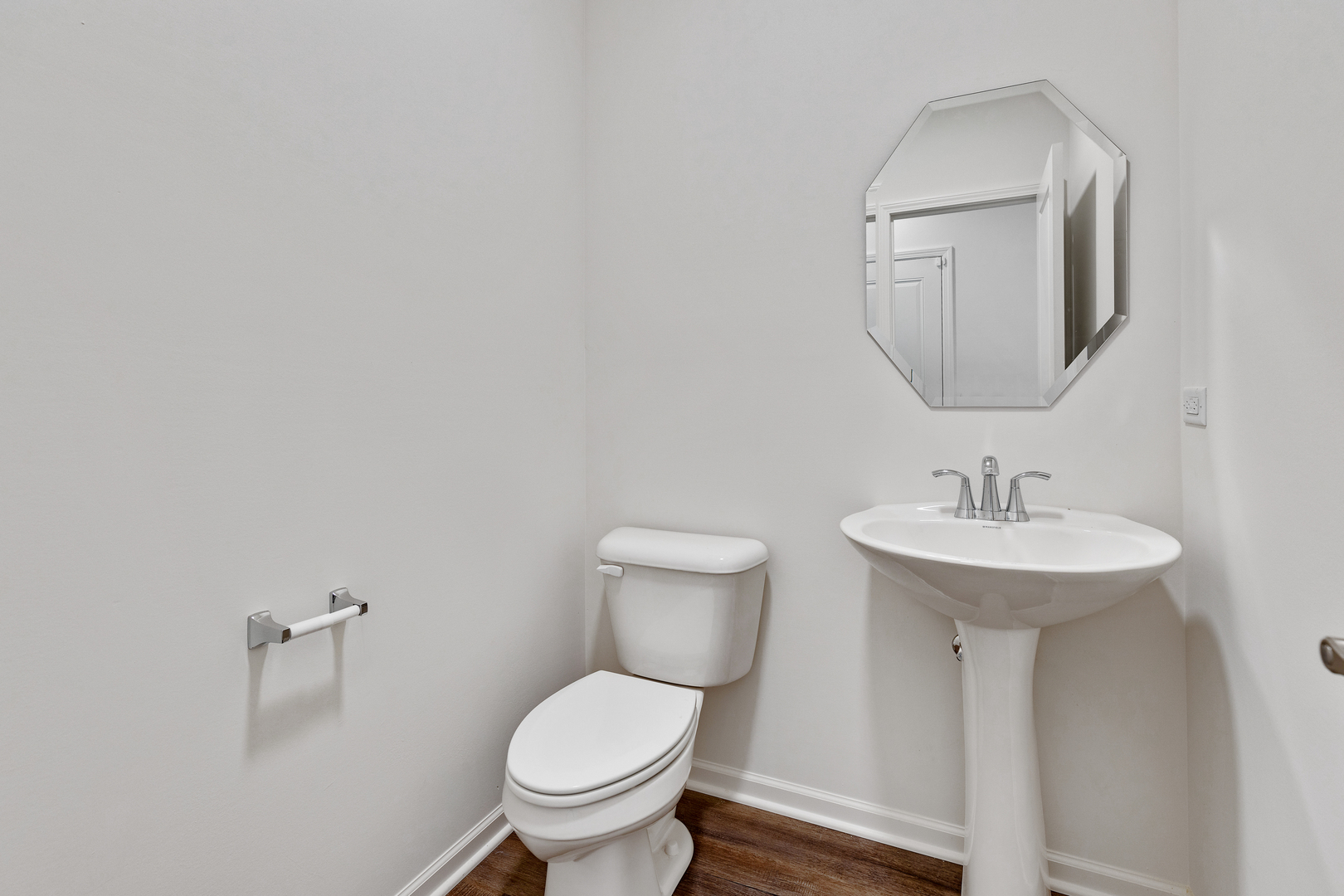 1464 Collins Street Elburn, IL 60119 - Photo 7 of 15 a bathroom with a toilet sink and mirror