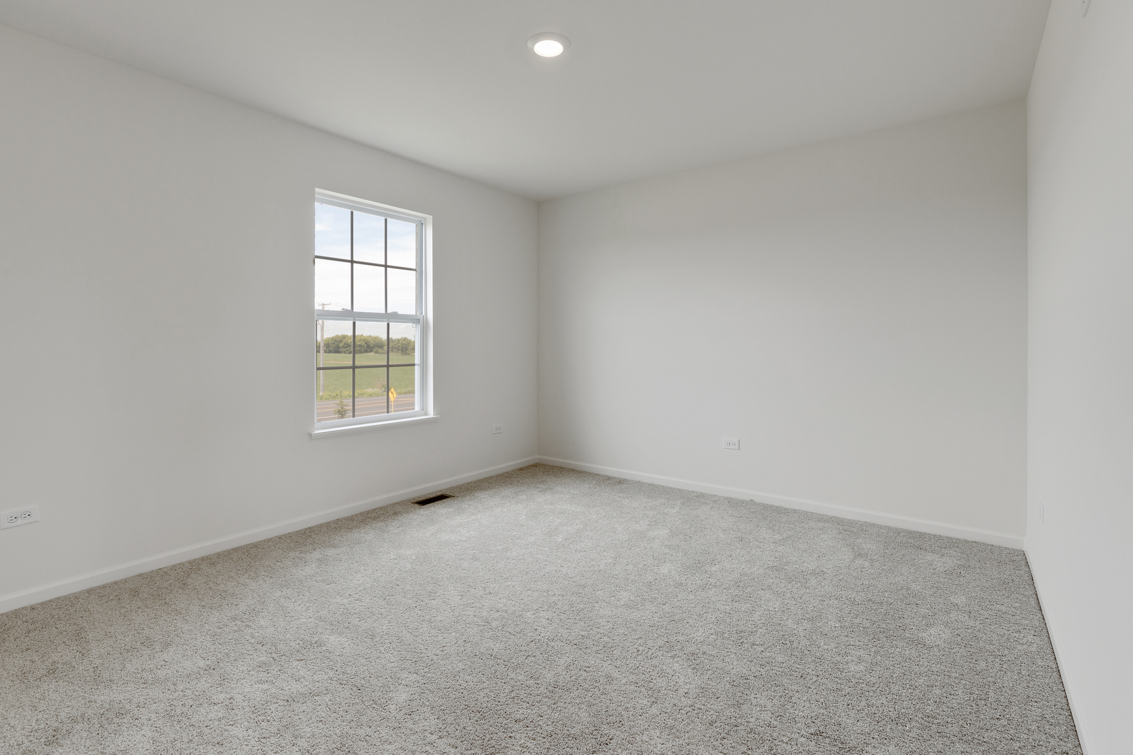 1464 Collins Street Elburn, IL 60119 - Photo 9 of 15 an empty room with windows