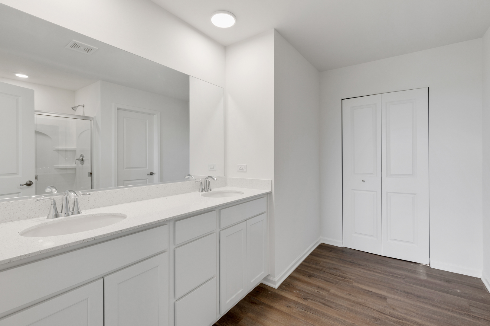 1464 Collins Street Elburn, IL 60119 - Photo 10 of 15 a bathroom with a double vanity sink and mirror