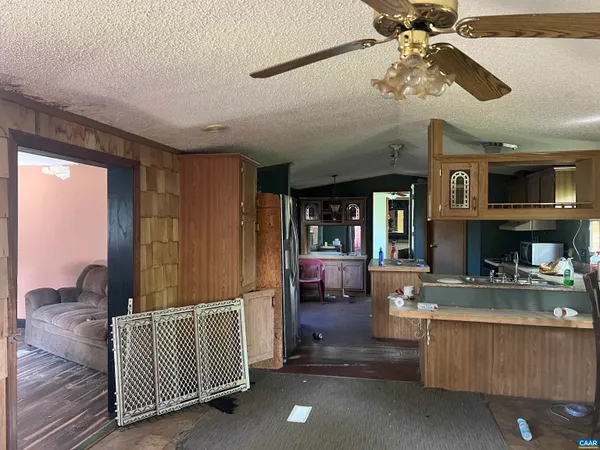 a bathroom with a sink and a chair