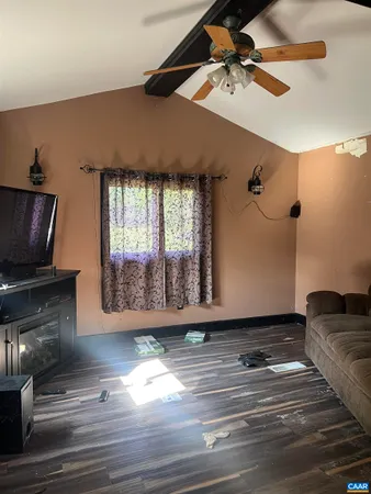 a view of a swimming pool with an outdoor space and seating area