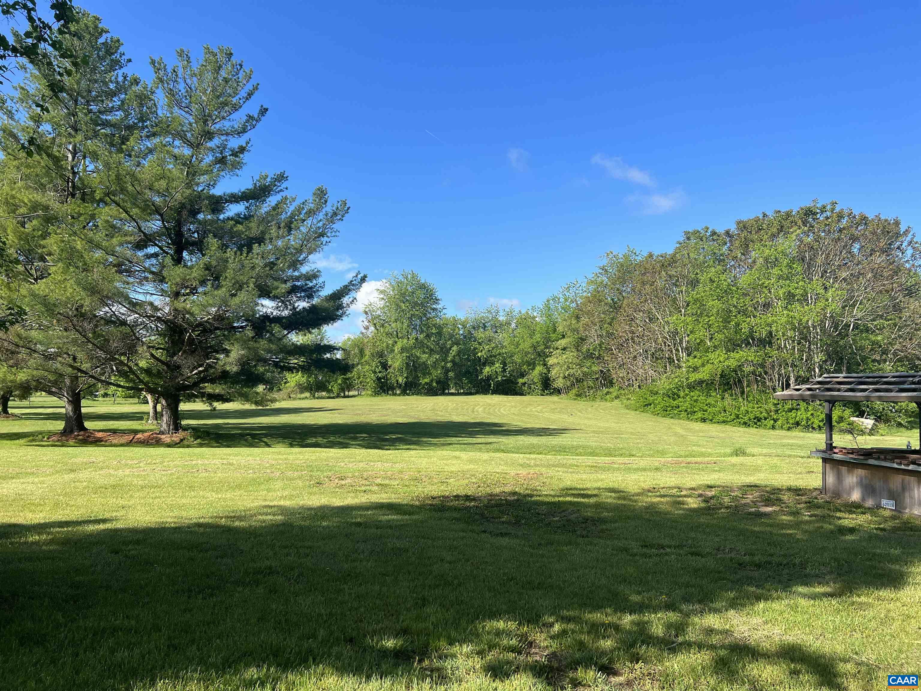 19 Mathews Lane Lyndhurst, VA 22952 - Photo 24 of 70 a view of a big yard with a large trees