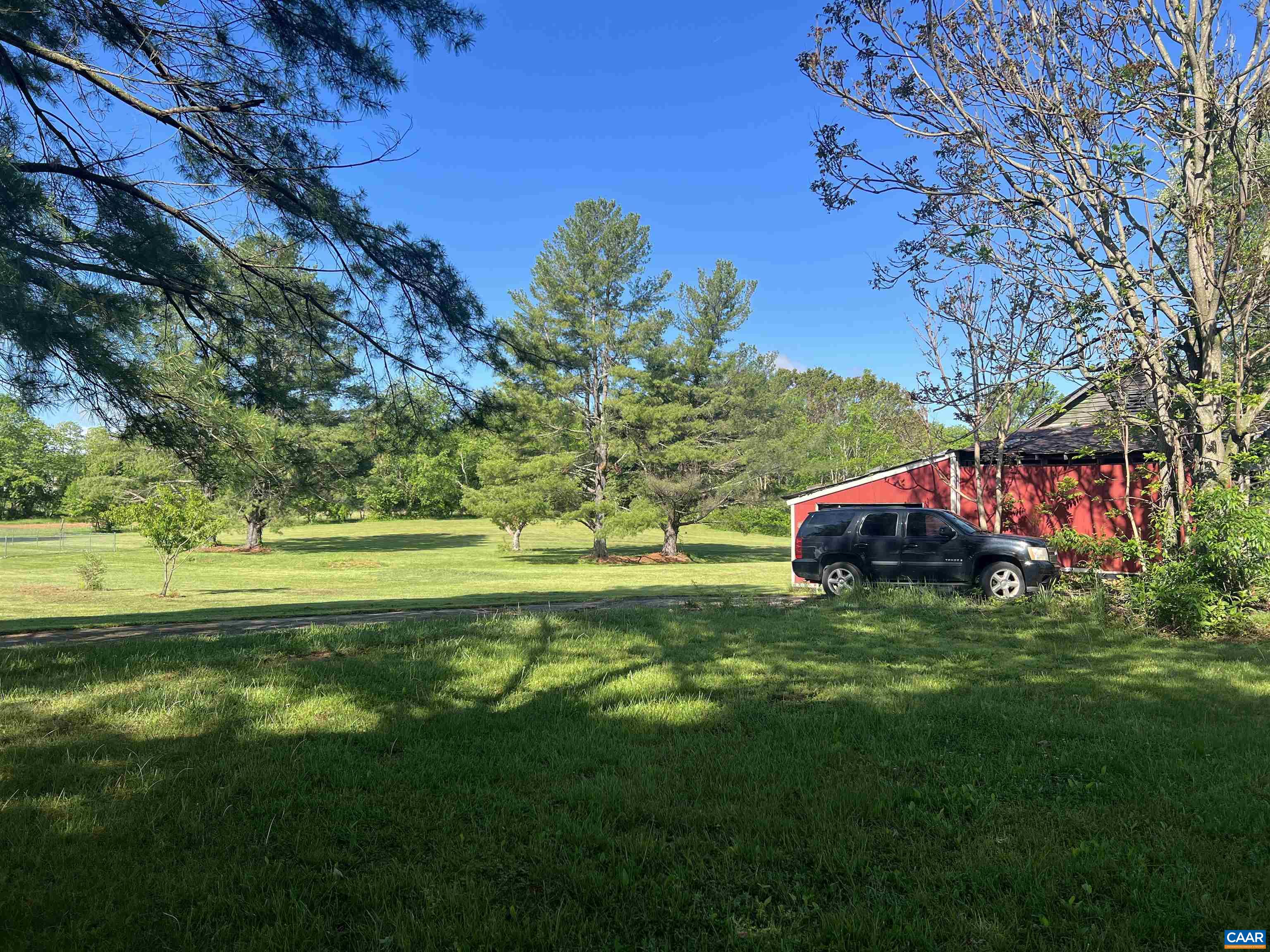 19 Mathews Lane Lyndhurst, VA 22952 - Photo 4 of 70 a backyard of a house with lots of green space and fountain