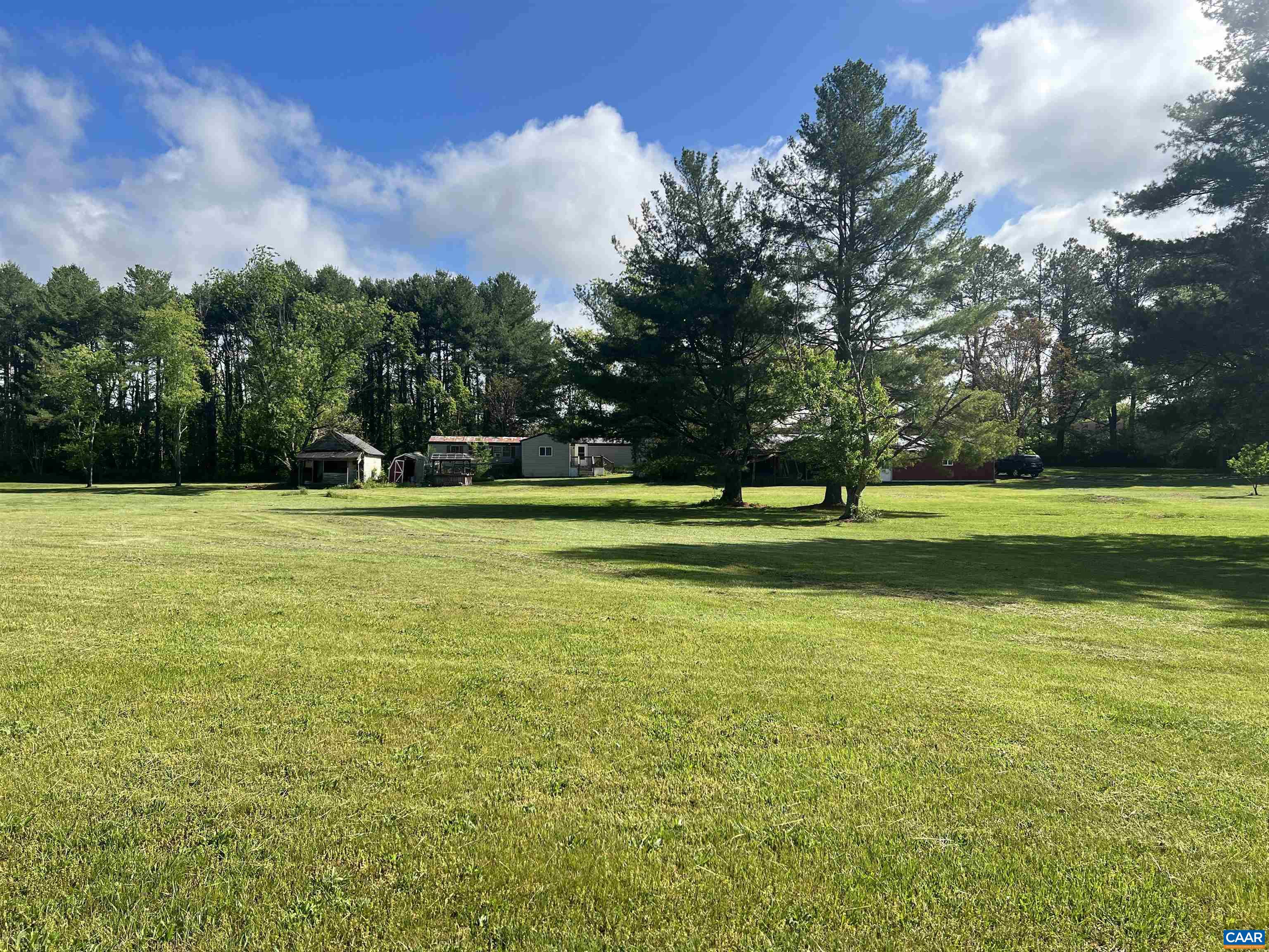 19 Mathews Lane Lyndhurst, VA 22952 - Photo 67 of 70 a view of a big yard with a trees in the background
