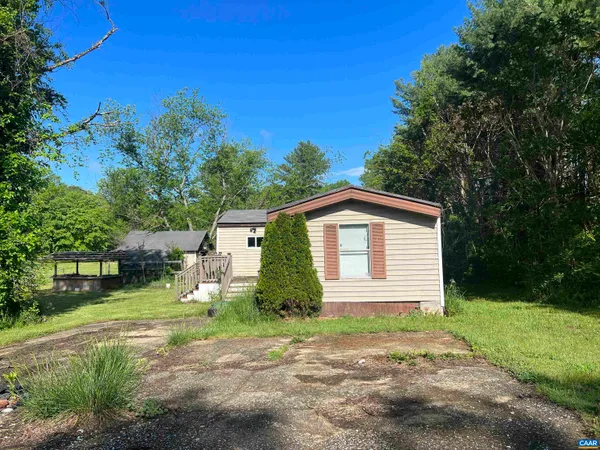 a kitchen with sink refrigerator and microwave