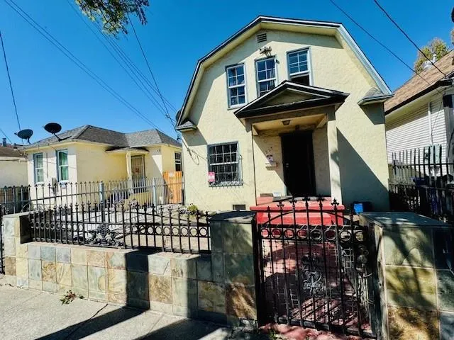 a front view of a house with balcony