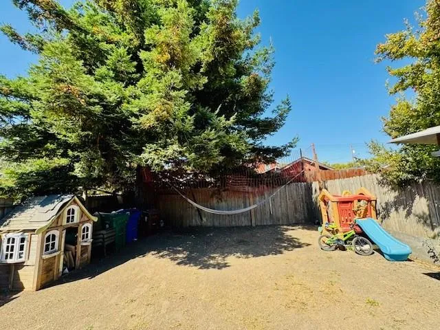 a view of a swimming pool and an outdoor space