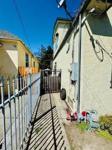 a view of balcony with wooden floor and potted plant