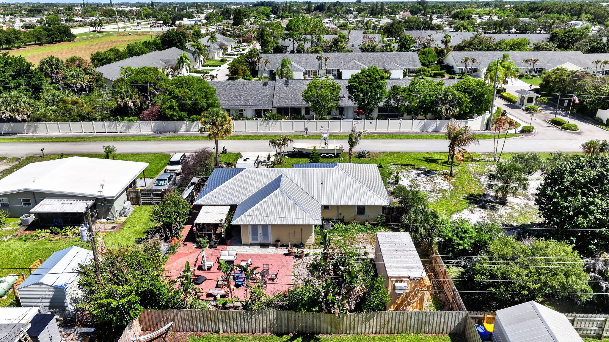 8143 Southeast Woodland Road Hobe Sound, FL 33455 - Photo 27 of 29 64-web-or-mls-DJI_20260501071830_0061_D
