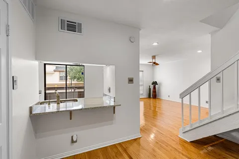 a lobby with furniture and window