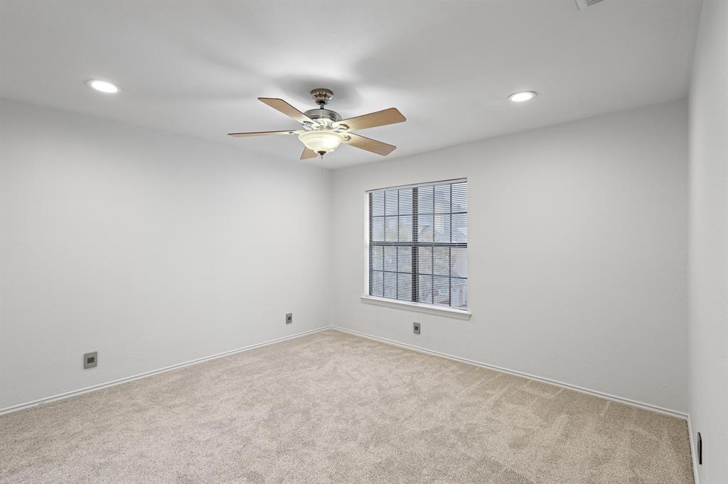 4130 Proton Drive, Unit 13A Addison, TX 75001 - Photo 25 of 40 Spare room featuring light carpet, recessed lighting, and ceiling fan