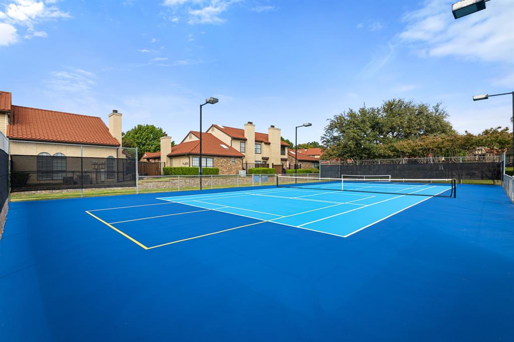 4130 Proton Drive, Unit 13A Addison, TX 75001 - Photo 33 of 40 View of tennis court with community basketball court