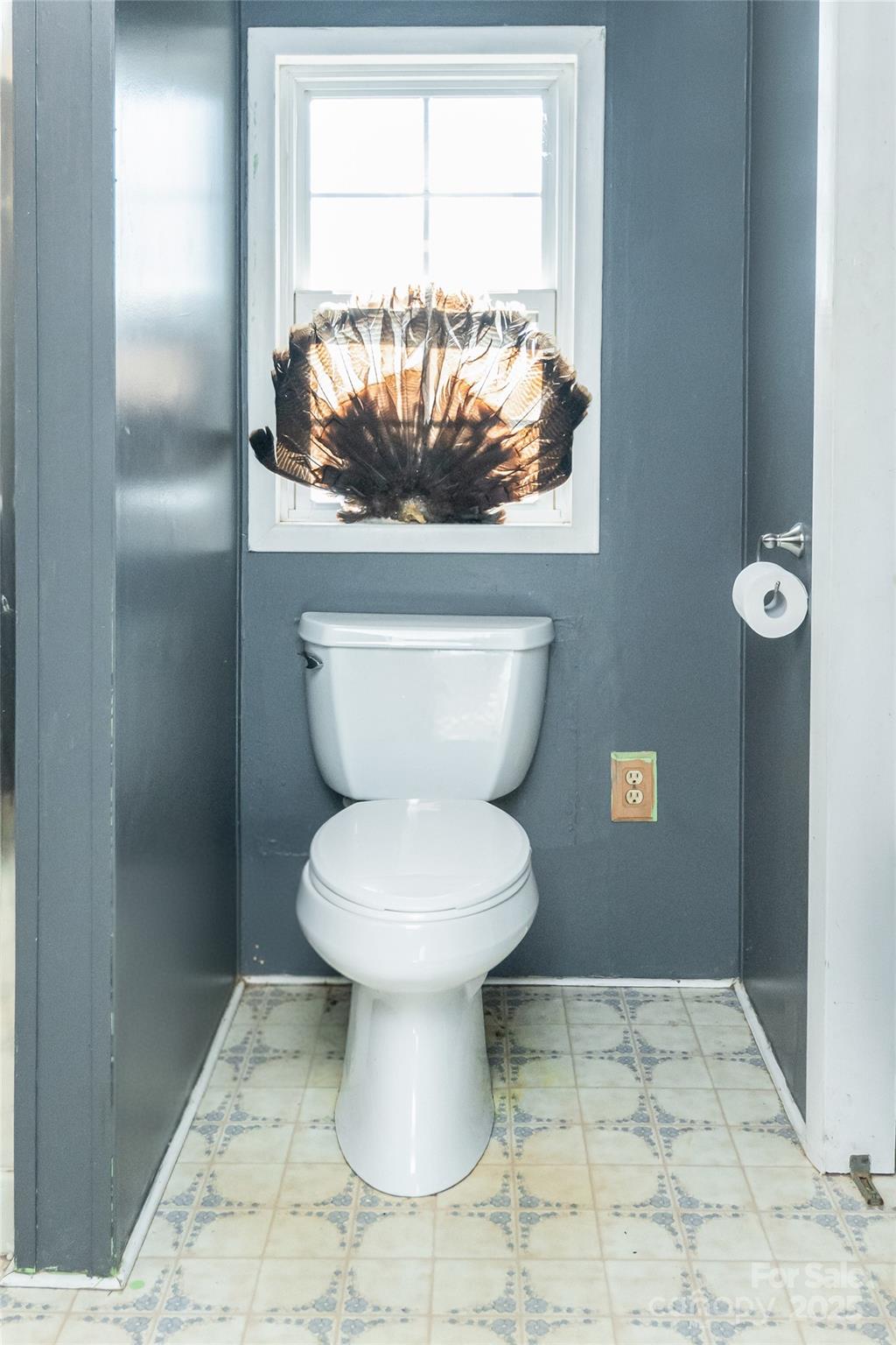 910 Summit Ridge Road Purlear, NC 28665 - Photo 11 of 28 a bathroom with a toilet and a shower