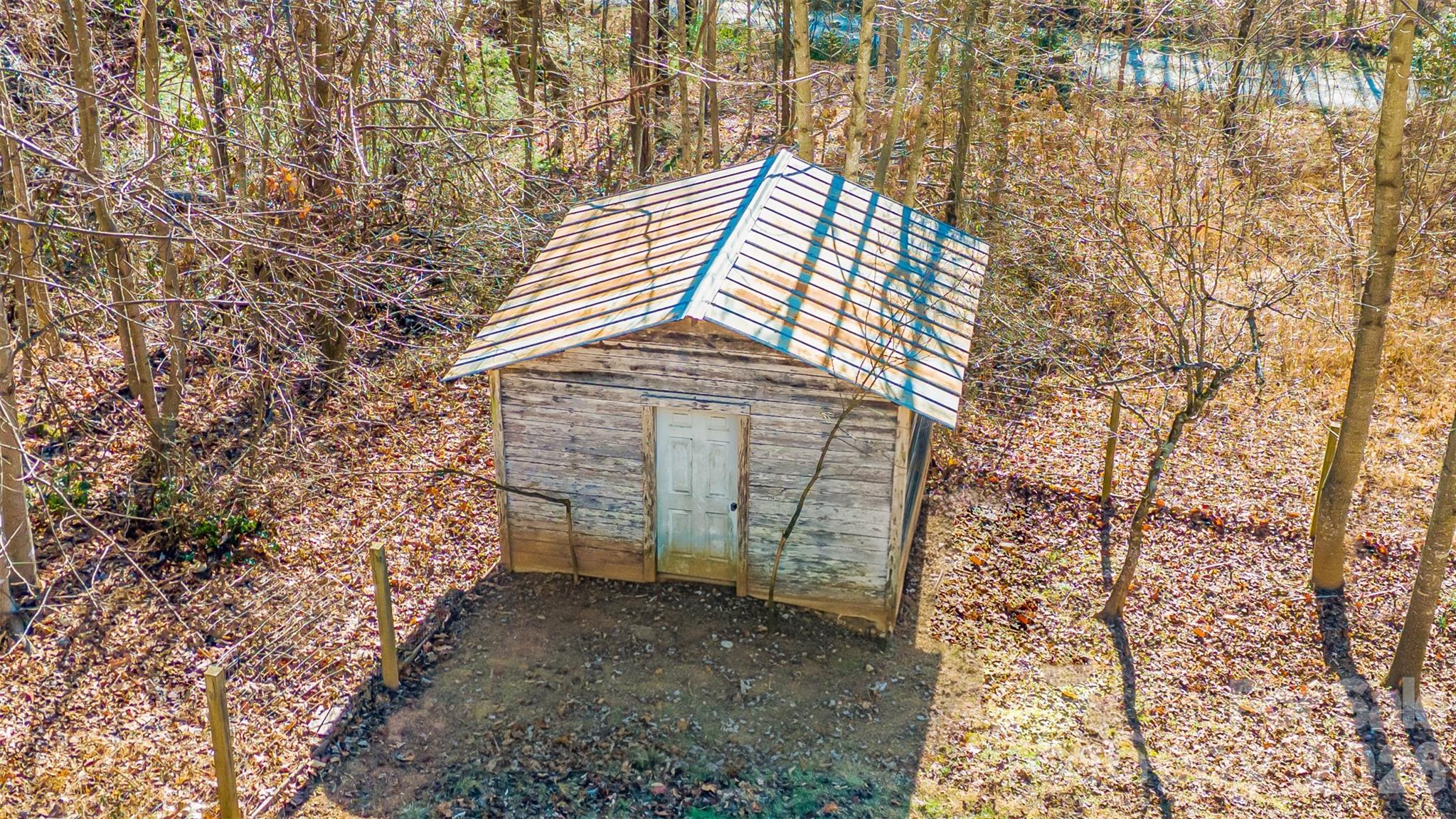 910 Summit Ridge Road Purlear, NC 28665 - Photo 11 of 17 a backyard of a house with lots of green space