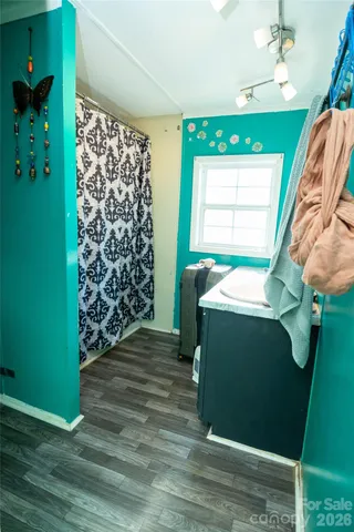 a bathroom with a toilet and a sink