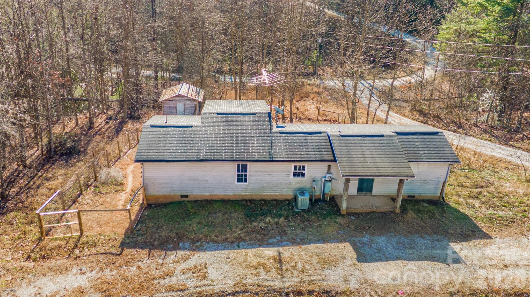 910 Summit Ridge Road Purlear, NC 28665 - Photo 5 of 17 a view of a house with a yard