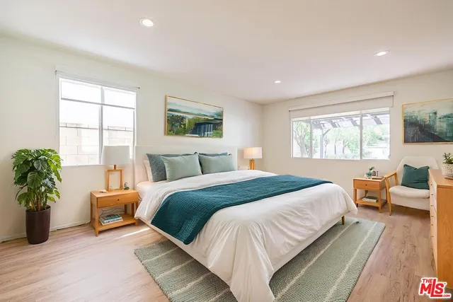 a bathroom with a granite countertop sink mirror and