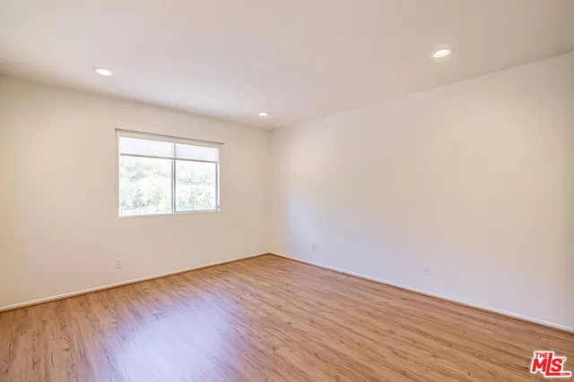 an aerial view of residential houses and outdoor space