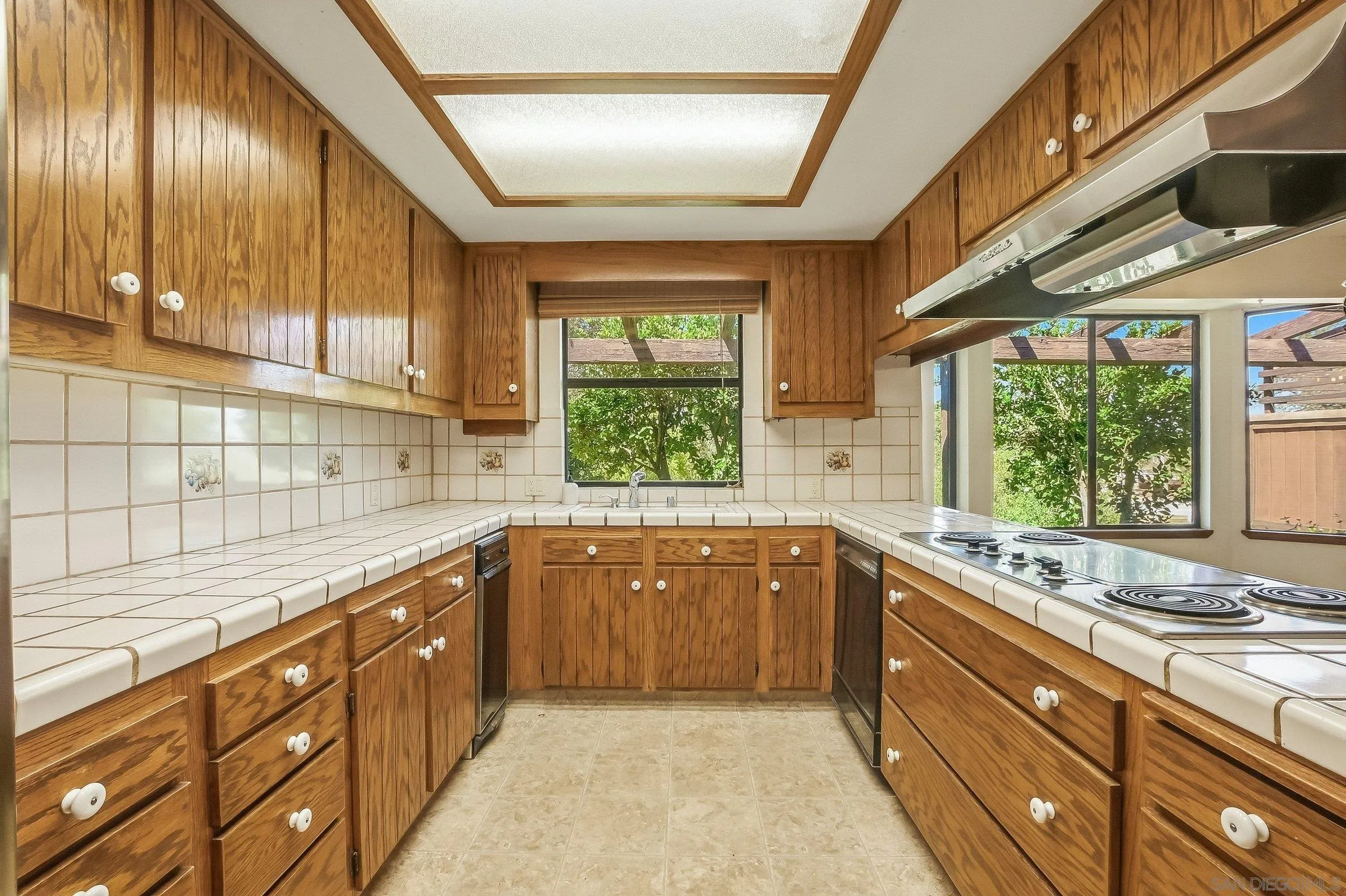 9907 Anderson Ranch Road Descanso, CA 91916 - Photo 13 of 42 a large kitchen with a sink and large window